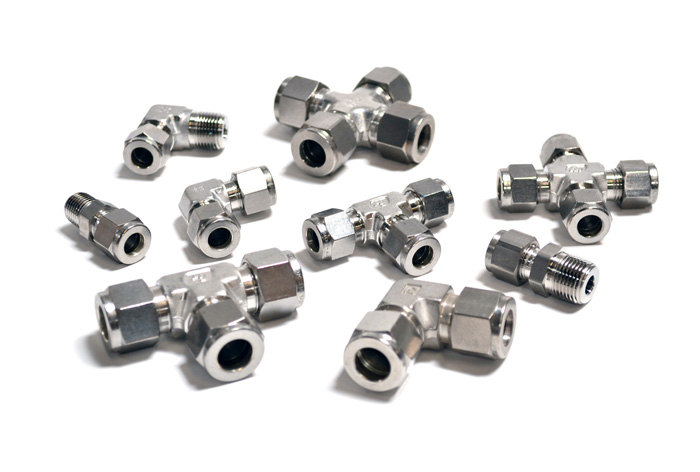 Stainless steel hose fittings and adapters Photo of Stainless Steel hose fittings on the white background